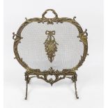 Fireplace screen, late 19th century, bronze. Fitting curved rocaille frame with spark grate,