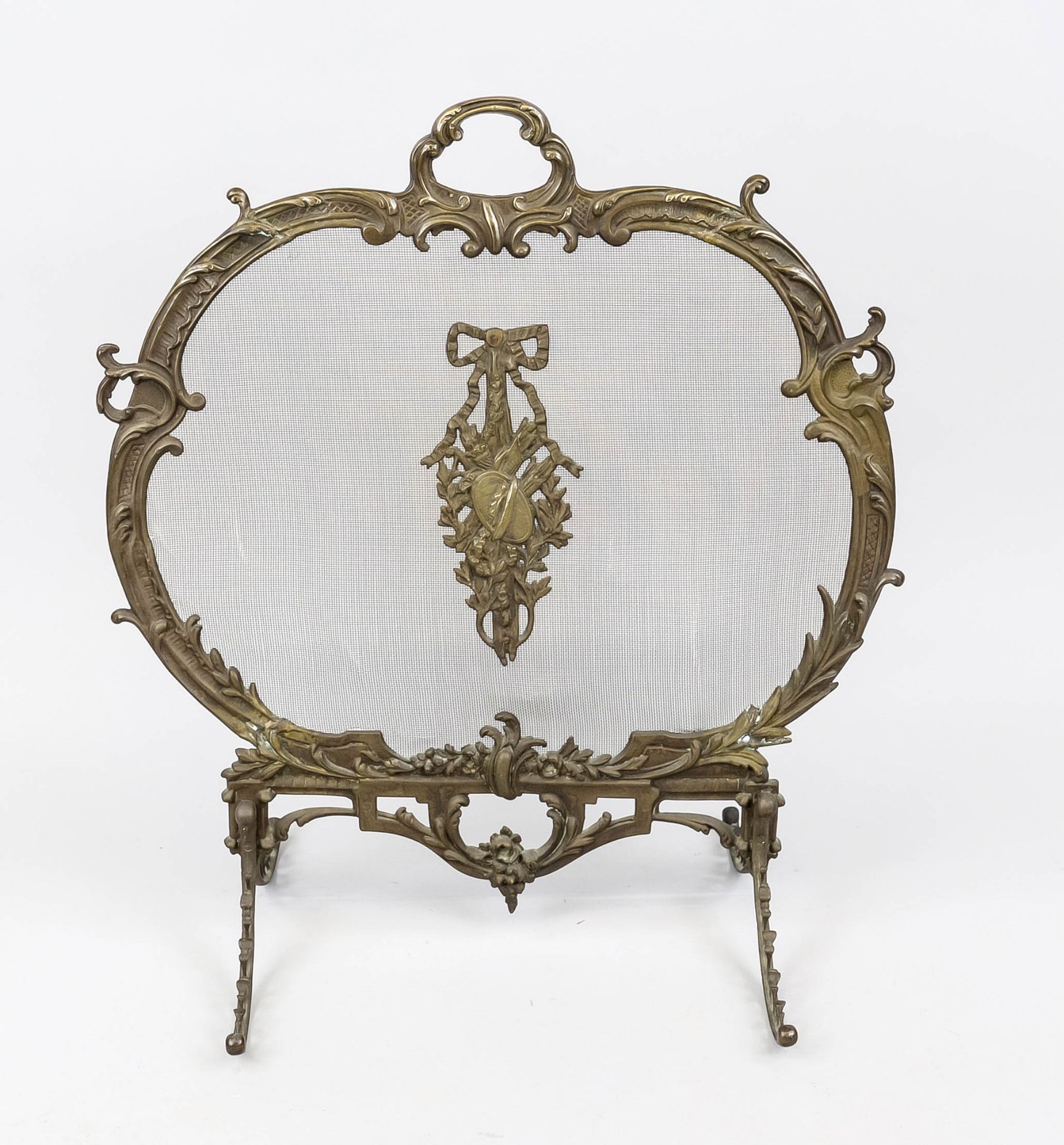 Fireplace screen, late 19th century, bronze. Fitting curved rocaille frame with spark grate,