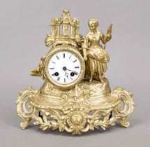 Pendulum France 2nd half 19th century, color gilded, with a woman at the clock drum in scenic
