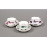 Three demitasse cups with saucer, Meissen, New Cut-out form, green court dragon and purple court