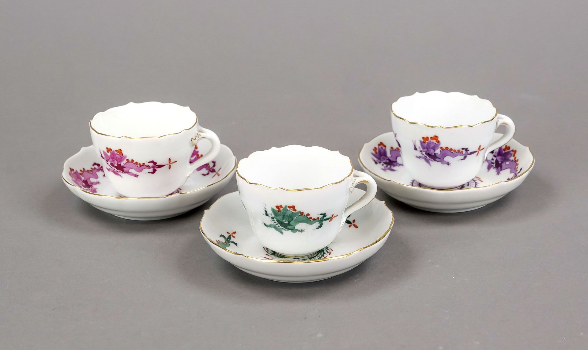 Three demitasse cups with saucer, Meissen, New Cut-out form, green court dragon and purple court