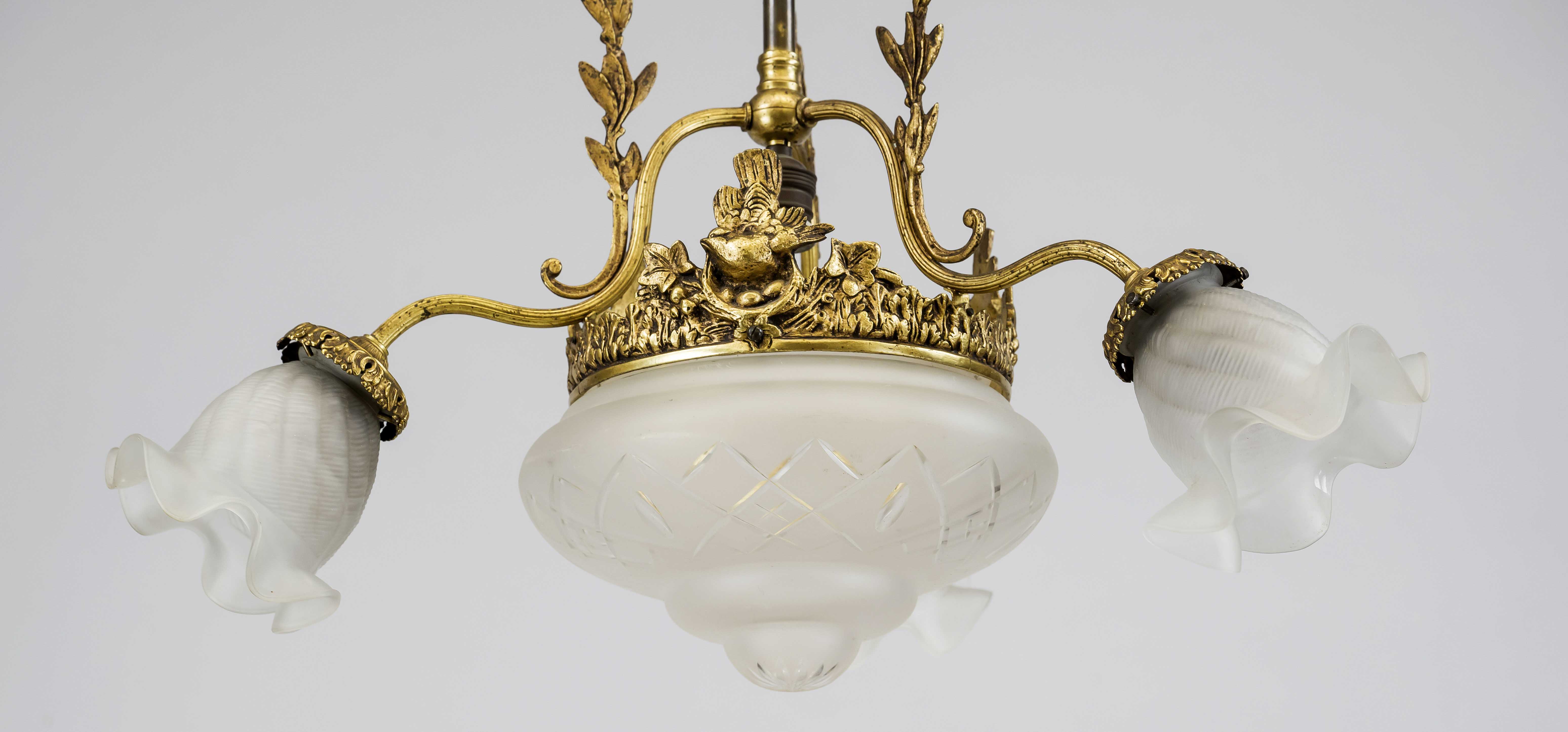 Ceiling lamp, late 19th century Ornamented brass wreath on 3 curved stems on a long shaft with - Image 3 of 3