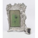 2 Art Nouveau picture frames, early 20th century, white metal. The larger frame with a seated lady