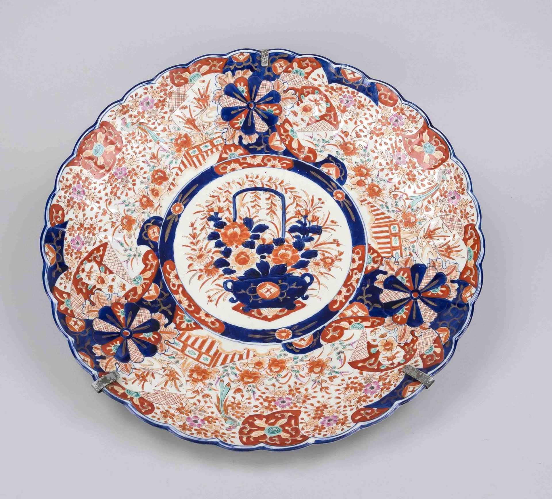 Very large Imari plate, Japan, 19th century, decorated in cobalt blue, iron red, green and gold, the