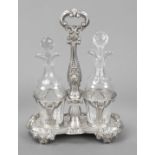A large cruet, France, c. 1900, MZ, silver 950/000, oval stand on 4 ornate feet, central handle in