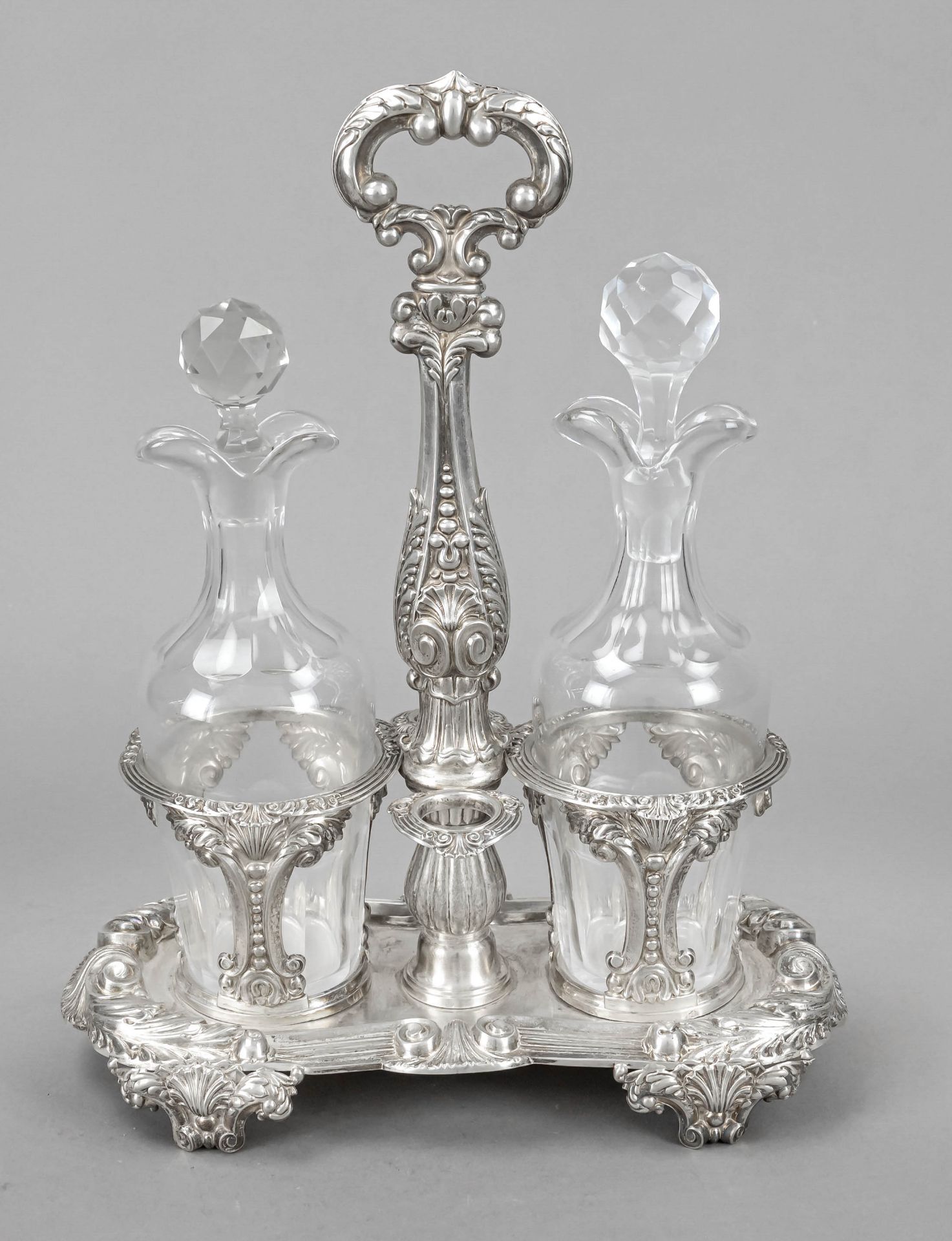 A large cruet, France, c. 1900, MZ, silver 950/000, oval stand on 4 ornate feet, central handle in