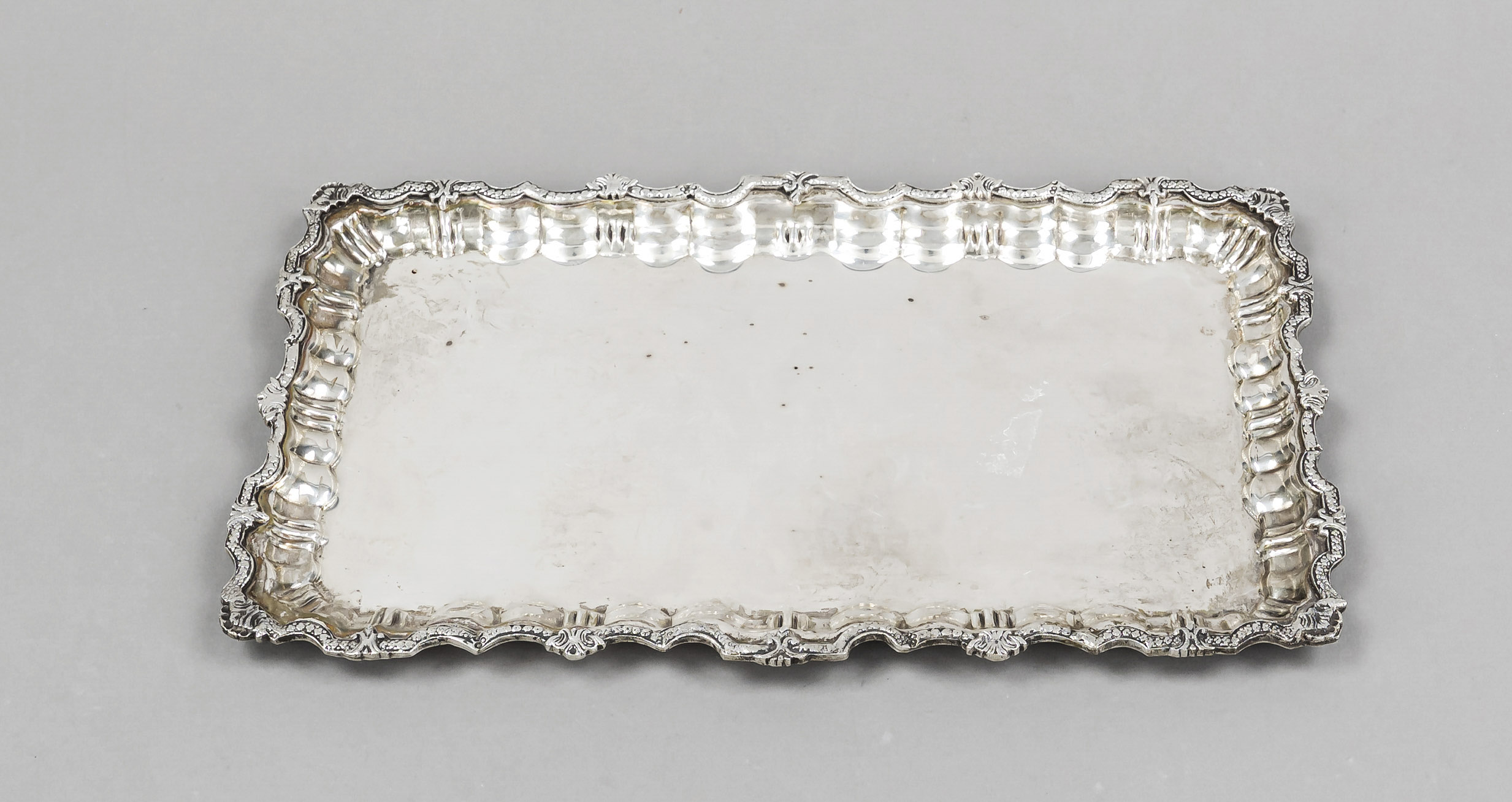 Rectangular tray, Egypt, 2nd half 20th century, hallmarked silver, fitted curved rim with relief