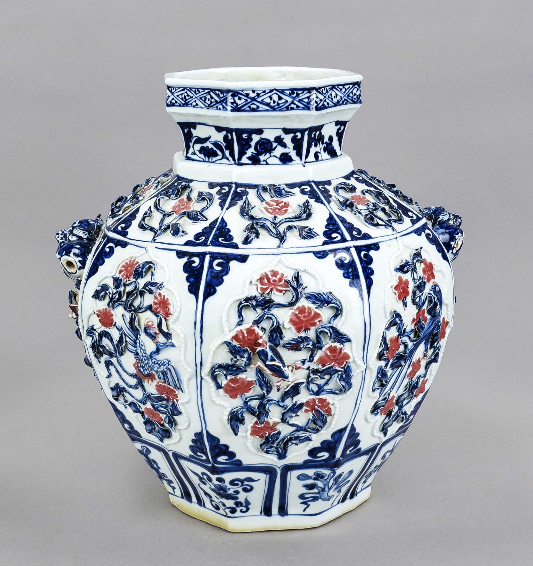 Large octagonal vase, China, 20th century, all sides with relief decoration as matching curved