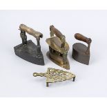 3 irons, 19th century, brass and iron. Various designs, 1 x with stand. Partially chipped, l. up