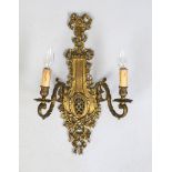 Wall lamp, 19th/20th century, brass. Open-worked and ornamented wall section with fluttering