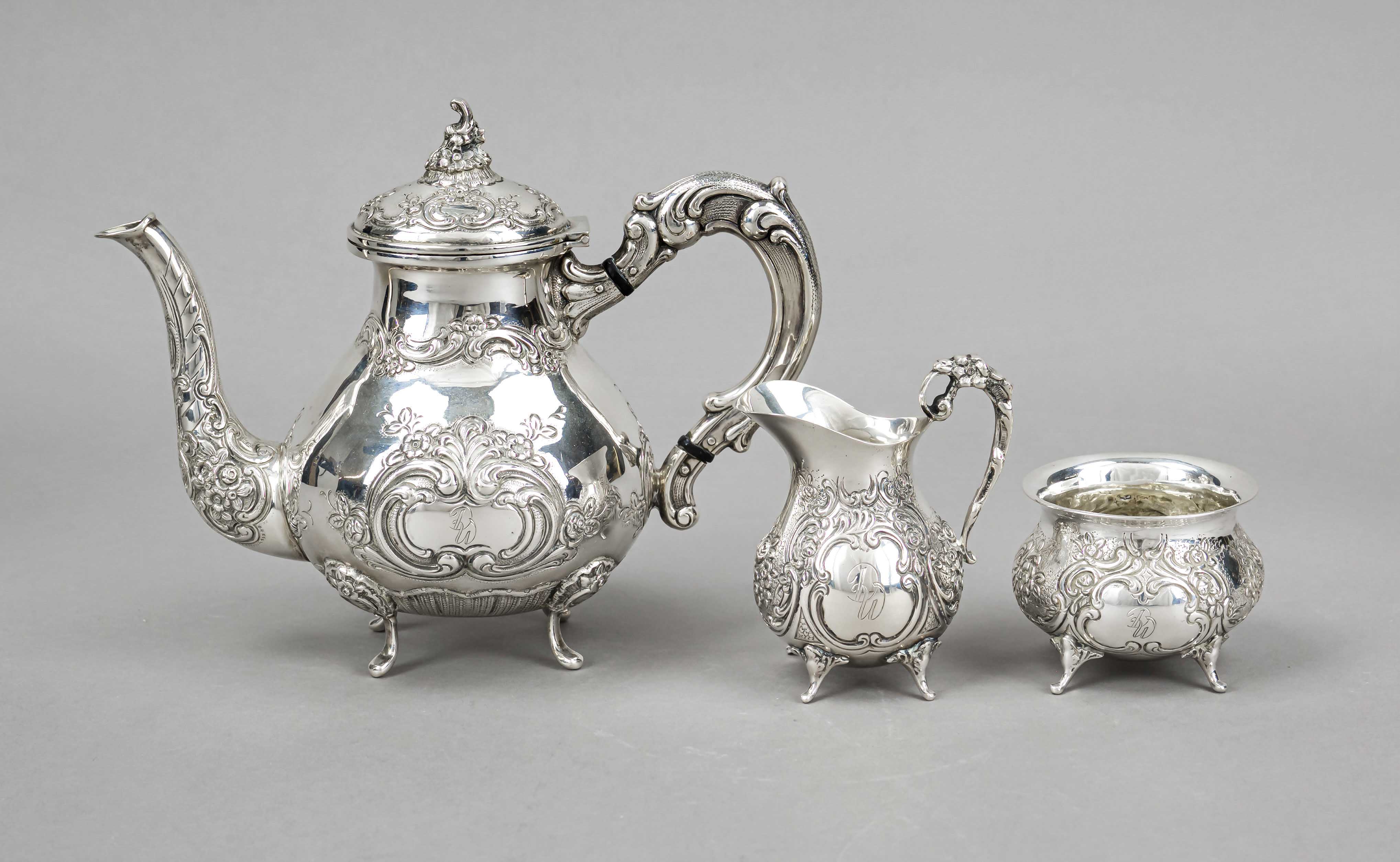 A three-piece mocha pot, 20th century, silver 835/000, the interior partly gilt, of neo-baroque