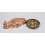 Two baking tins, 19th/20th century, one in the shape of a fish, copper, tinned inside, with