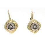 Diamond earrings GG/WG 585/000 with 2 brilliant-cut diamonds, total 0.05 ct W/VS-SI, l. 14 mm, 2.2