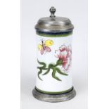 Faience jug, c. 1800, with pewter lid mounting. Cylindrical body, polychrome painted with flower and