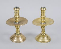 2 candlesticks, 18th century, brass/bronze. Ballustrated shaft, large drip tray in the center,