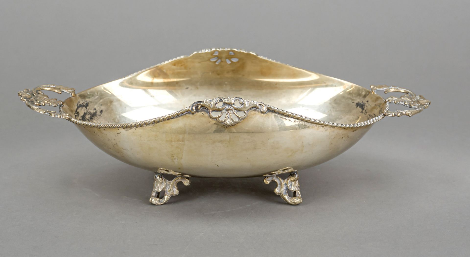 Oval bowl, Italy, mid-20th century, silver 800/000, on 4 feet, smooth body curved inwards, applied