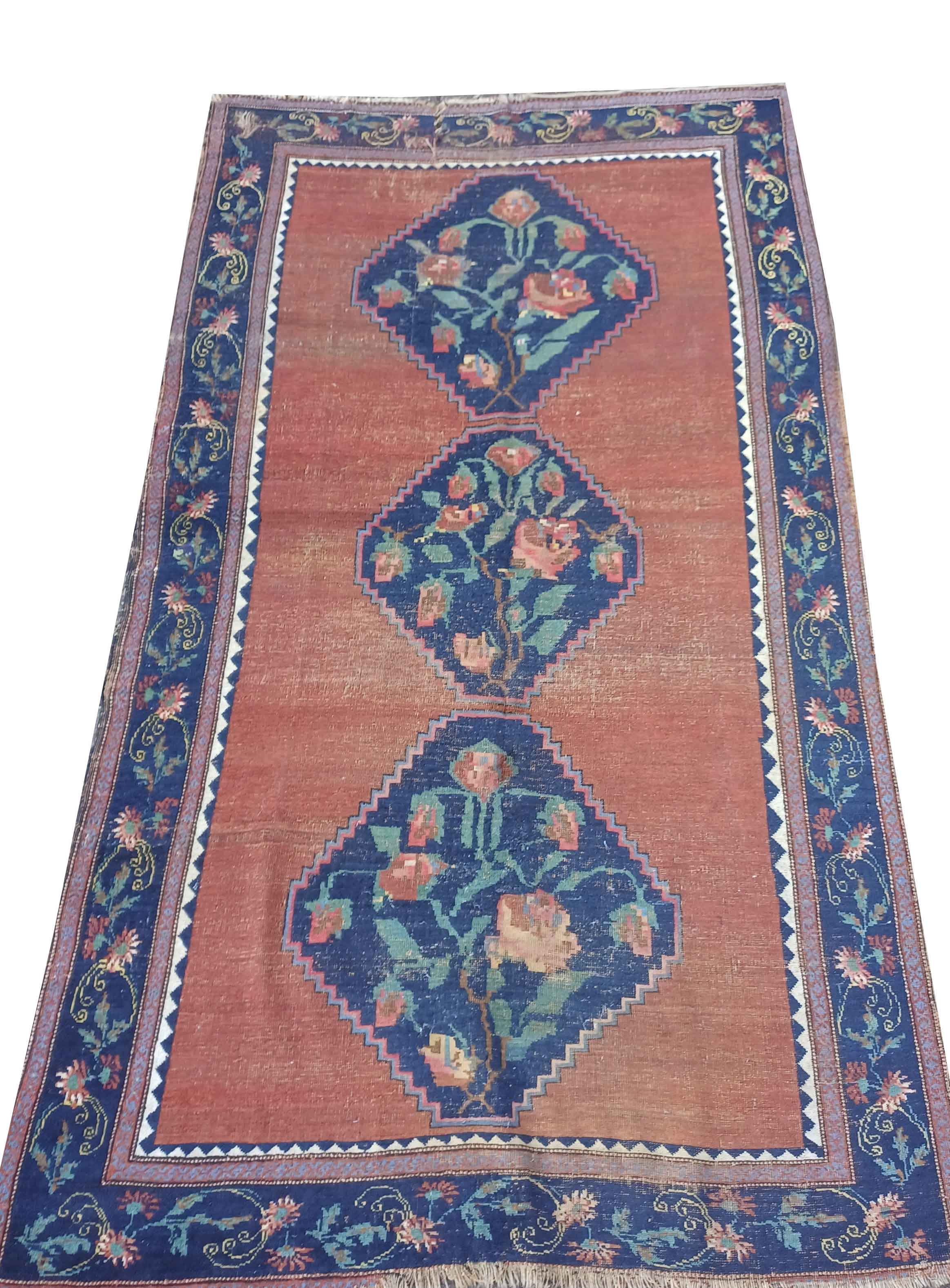 Carpet, Rug, Karabagh. Worn areas, edges and fringes worn, some moth damage, rupture to one of the