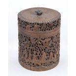 Tea caddy, China (Canton), around 1900, dark hardwood. Round body with hinged lid, carved all around