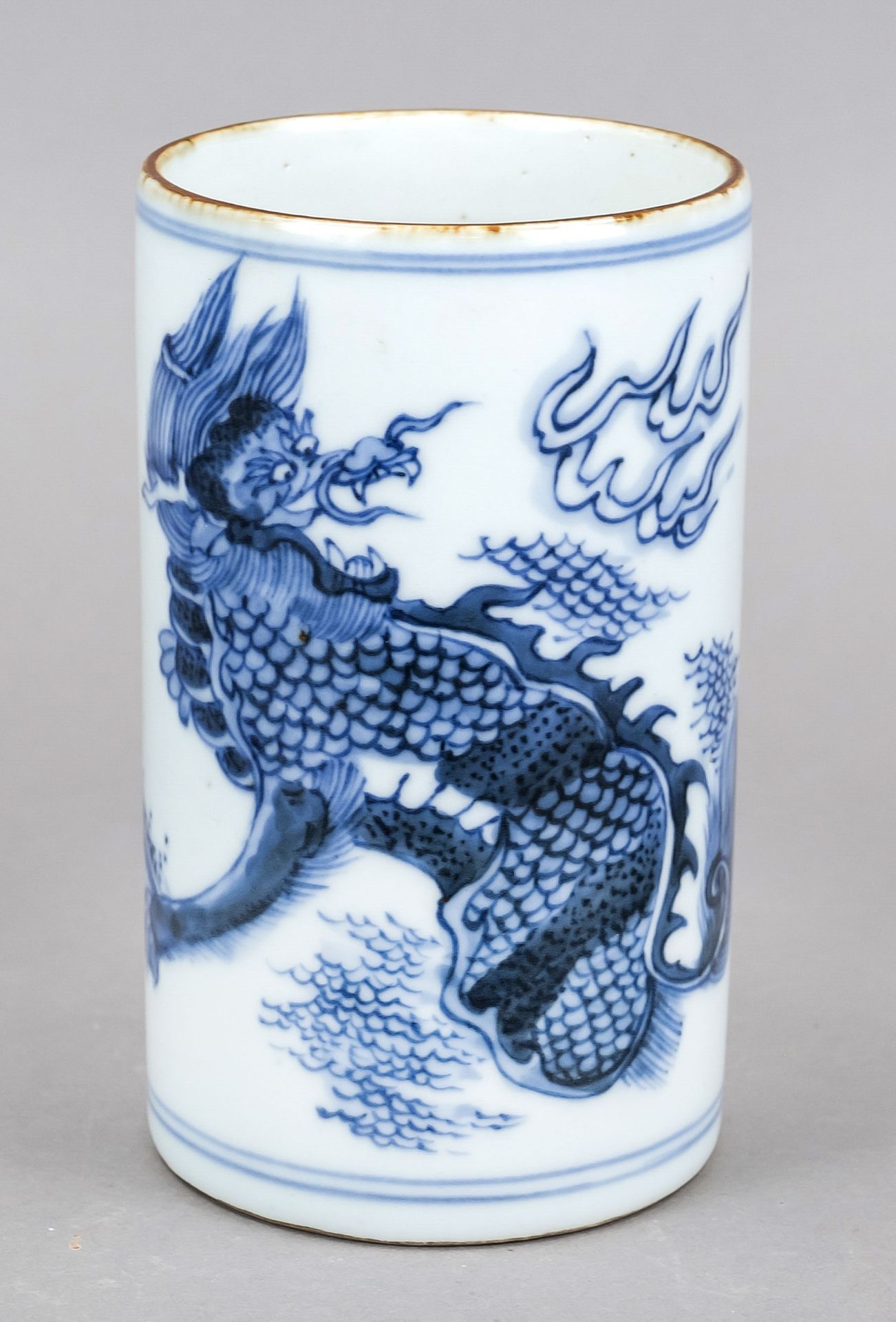 Kangxi style brush cup (Bitong), China. Revolving decoration in cobalt blue with quilin/dragon in