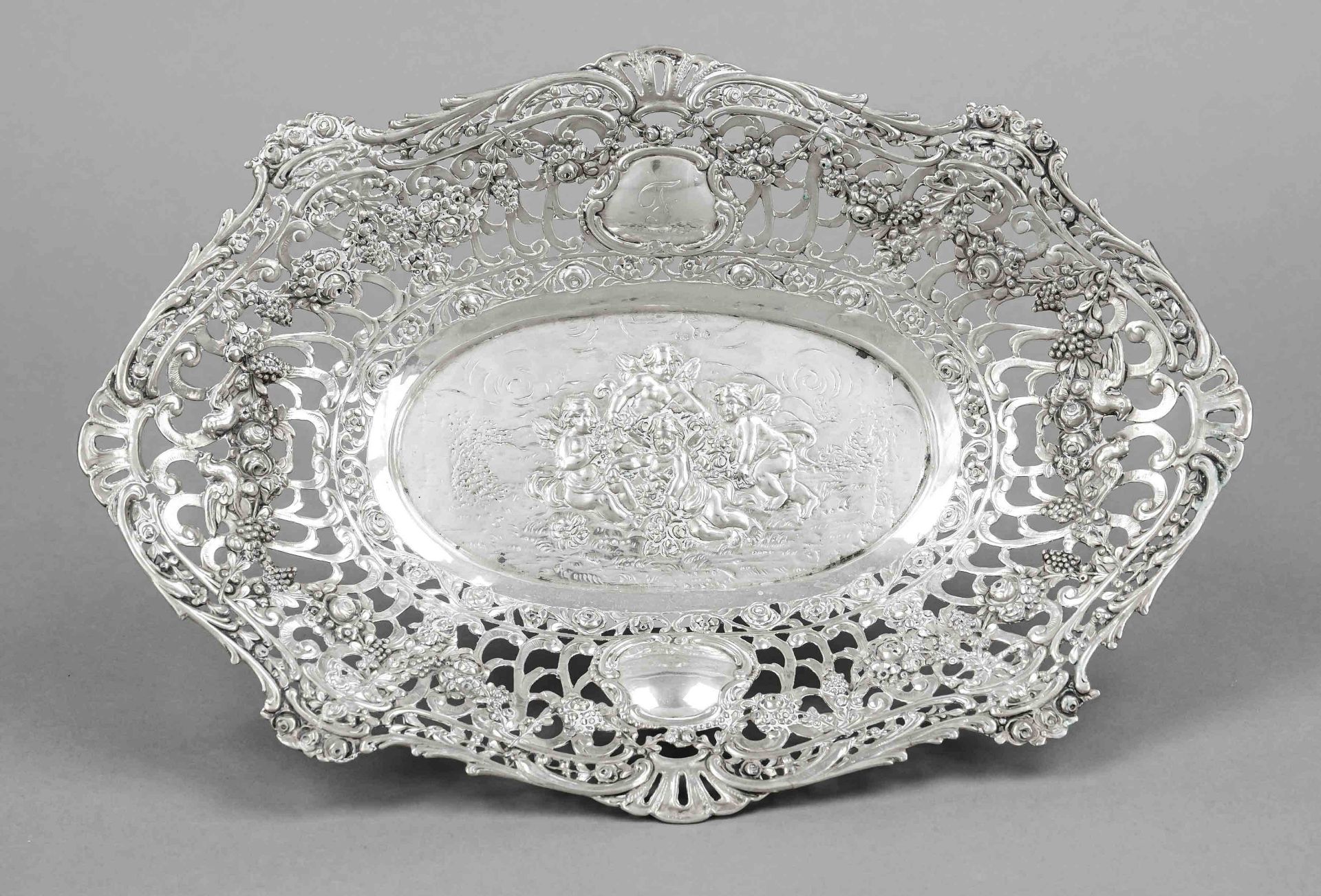 Oval openwork basket, German, 20th century, silver 800/000, of matching curved form, wide, richly