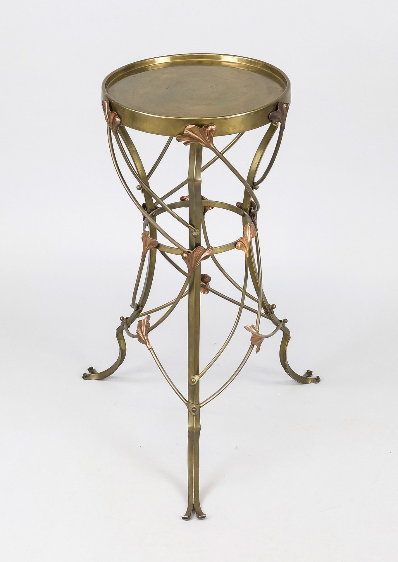 Art Nouveau plant table, c. 1900, brass and copper. Tripod base with leafy tendril. Round top,
