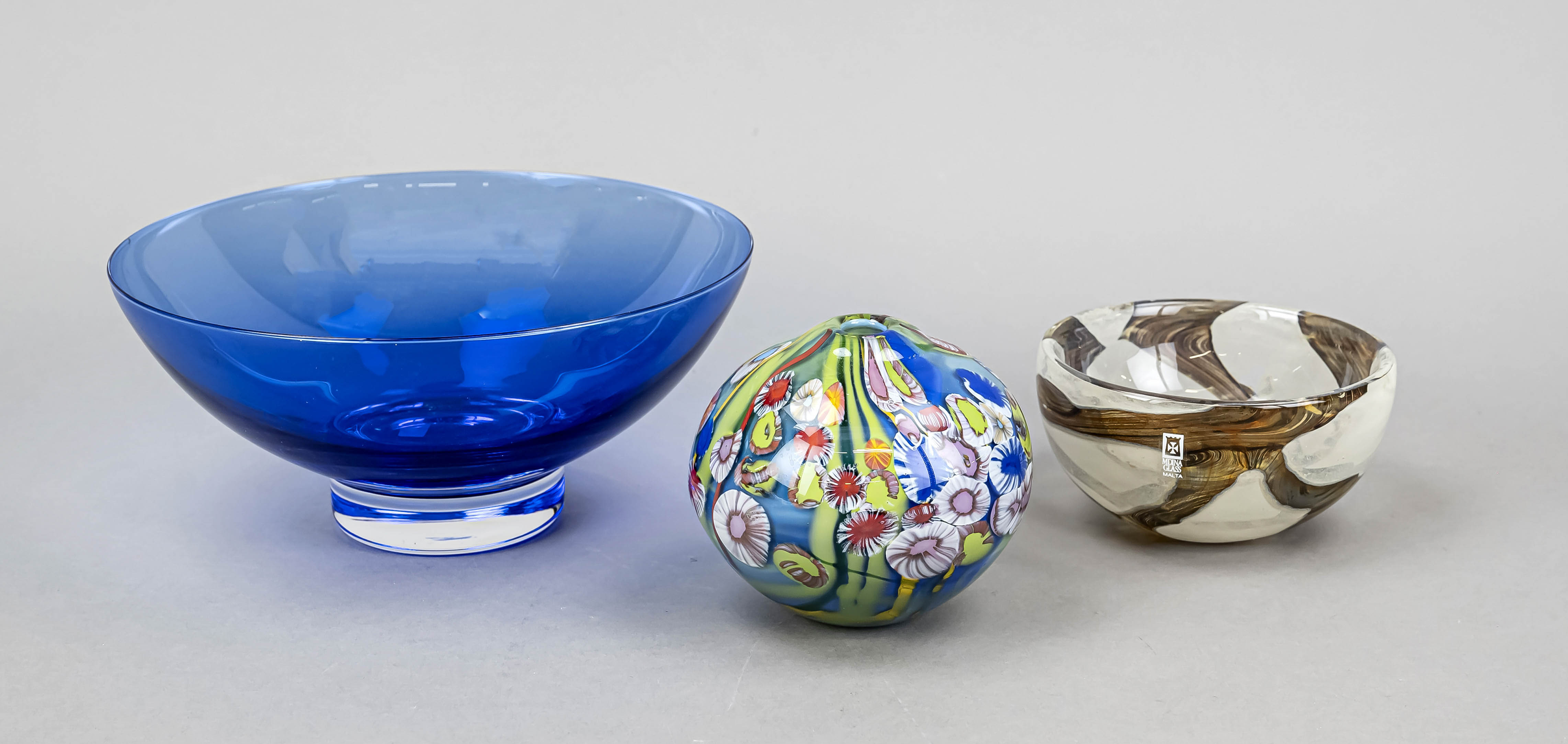 Two round bowls and a vase, 20th century, clear and colored glass, 1x with fused bands, 1x with