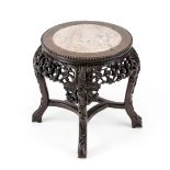 Side table, China, c. 1900, dark hardwood carved with plum blossom, stone top, rubbed and slightly
