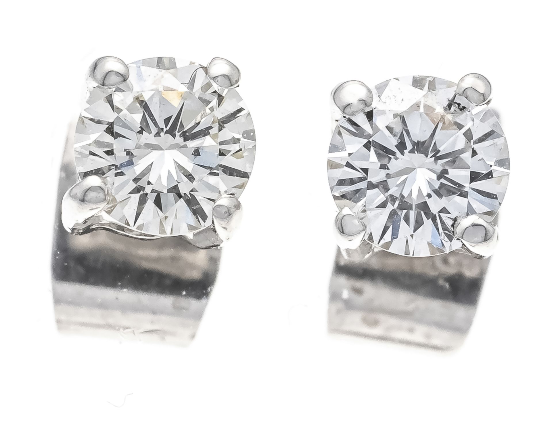 Brilliant stud earrings WG 585/000 with 2 brilliant-cut diamonds, total 0.60 ct Wesselton - slightly