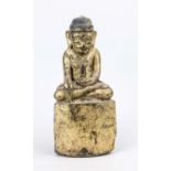 Buddha, Burma/Myanmar, probably 19th century, gilded wood/gold lacquer. Gilding heavily rubbed, base