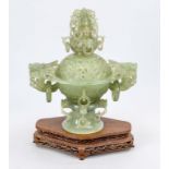 Large censer, China 20th century, celadon-colored jade? Consisting of 2 open-worked parts. Placed on