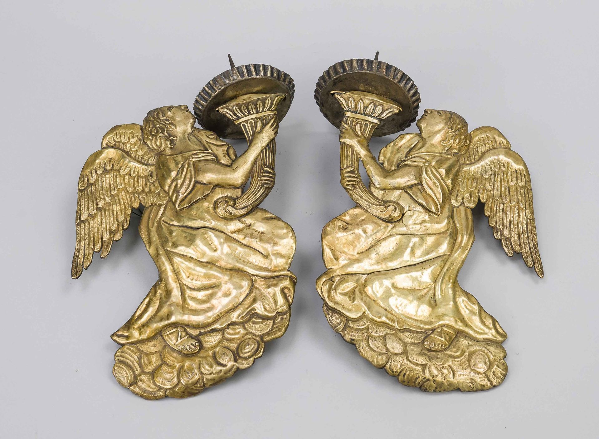 Pair of wall candlesticks, 18th/19th century, chased sheet brass, gilded, each with a bas-relief