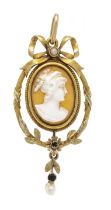Filigree gem pendant circa 1880 GG 585/000 unmarked, tested, with an oval shell gem, finely cut in