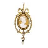 Filigree gem pendant circa 1880 GG 585/000 unmarked, tested, with an oval shell gem, finely cut in