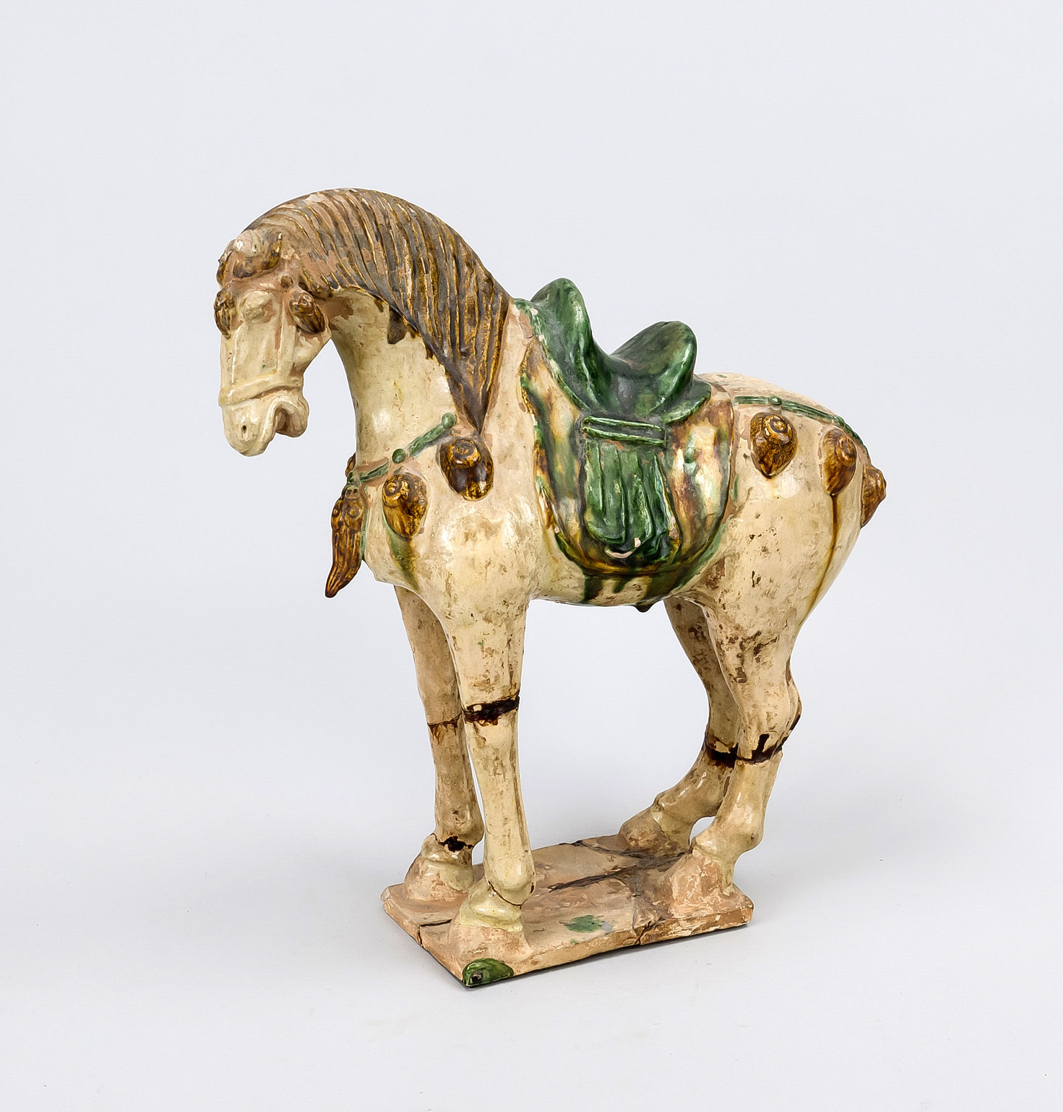 Horse, China, probably Tang dynasty. Earthenware with 3-color glaze (Sancai). Standing on a