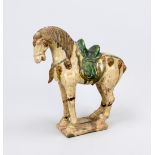 Horse, China, probably Tang dynasty. Earthenware with 3-color glaze (Sancai). Standing on a