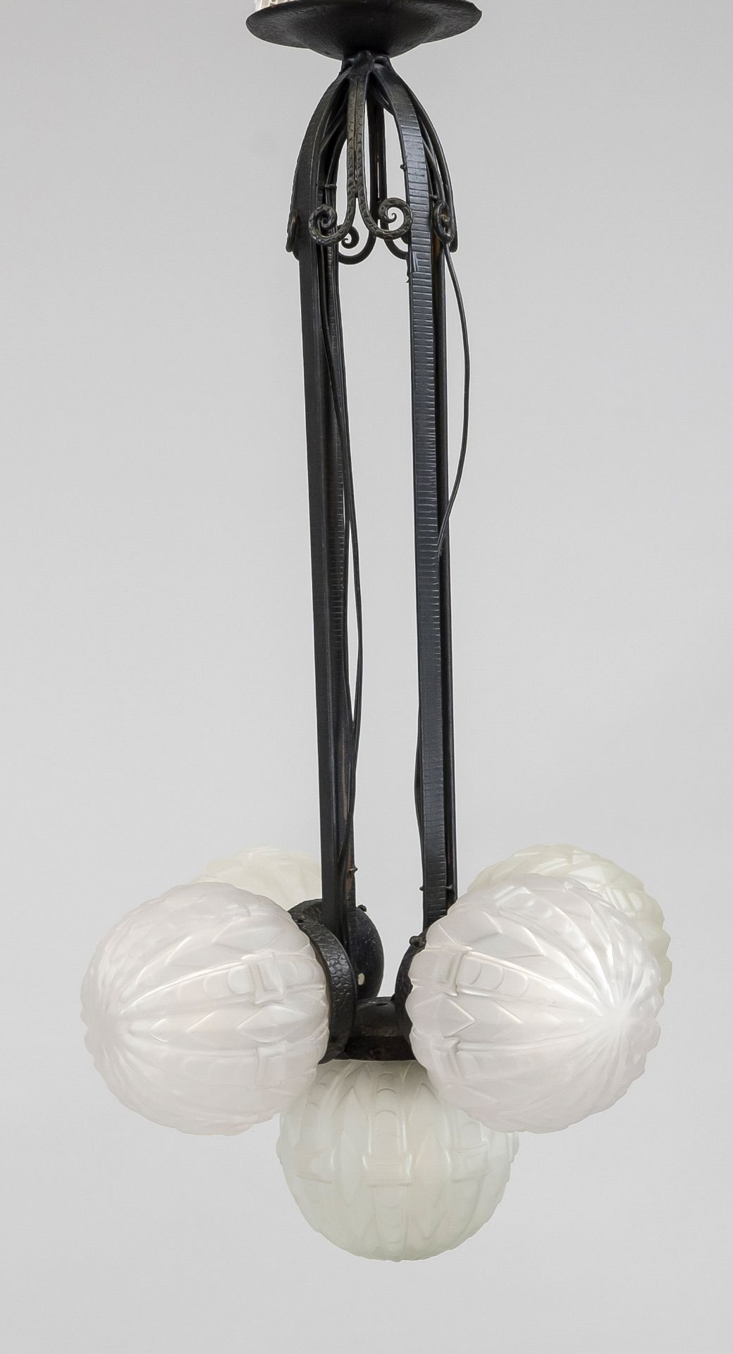 Art deco ceiling lamp, 1930s. Wrought-iron frame with 5 glass globes with geometric ornament of