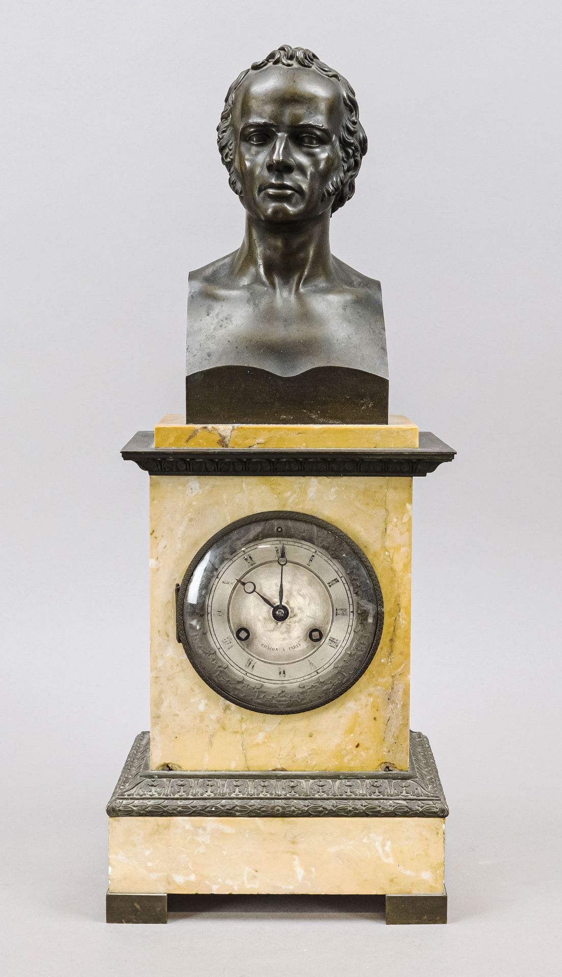 Pendulum, beige marble, marked '' Gilion a`Paris'', with unidentified bronze bust, marble with