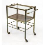 Art Deco serving trolley, c. 1920, brass frame with removable tray, glazed on all sides, hinged door