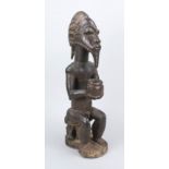 Fetish figure, probably Congo, 19th/20th century, dark hardwood. Openwork, remains of old paint,