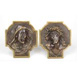 Two 19th century devotional reliefs, Mary and Christ as busts on a cross-shaped plate, patinated
