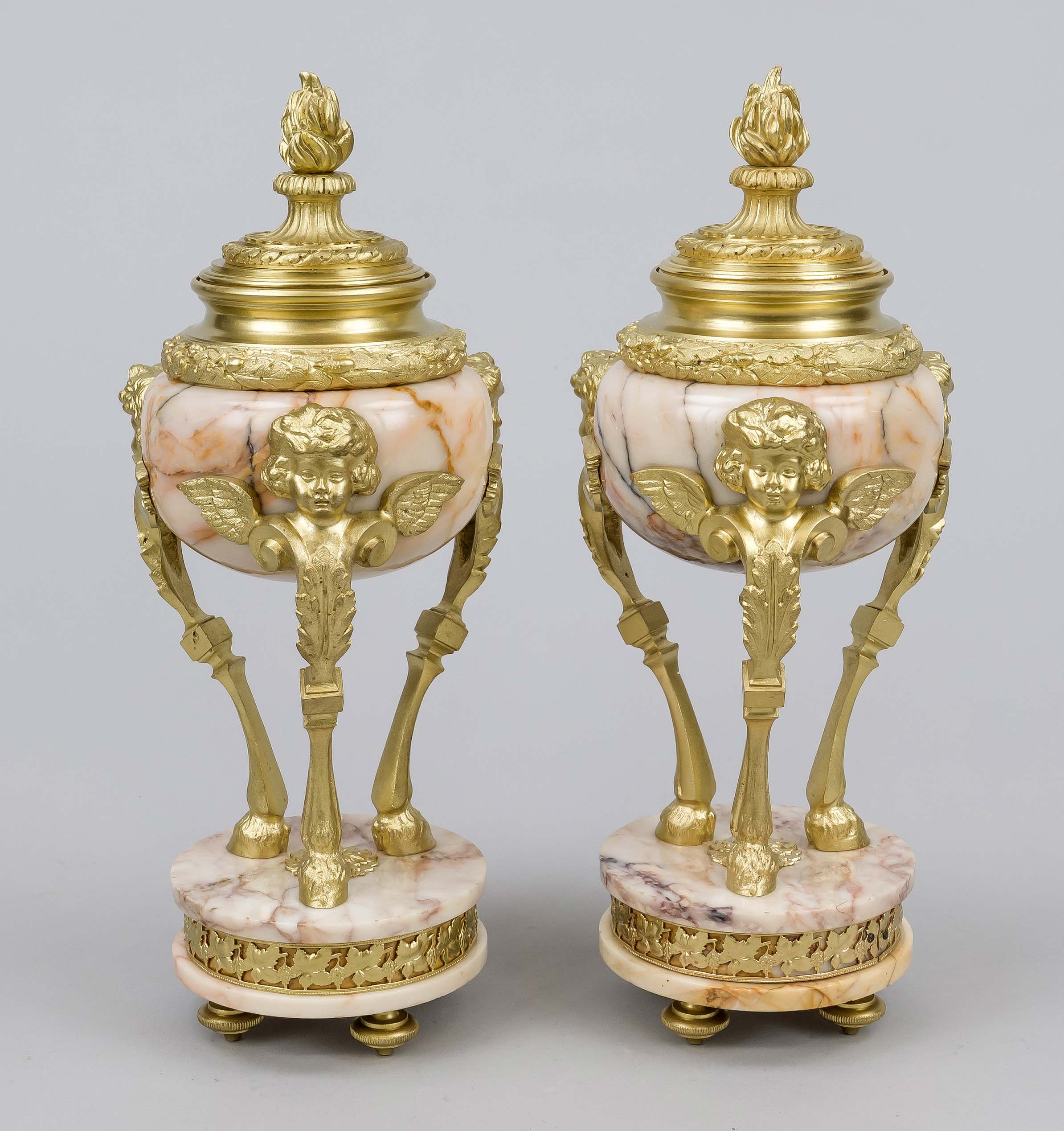 Pair of side plates, France 19th century, pink marble with gilt bronze applications, round plinth on