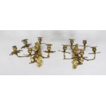 Pair of 5-light sconces, probably German c. 1760, bronze with residual gilding. Matching, ornamented