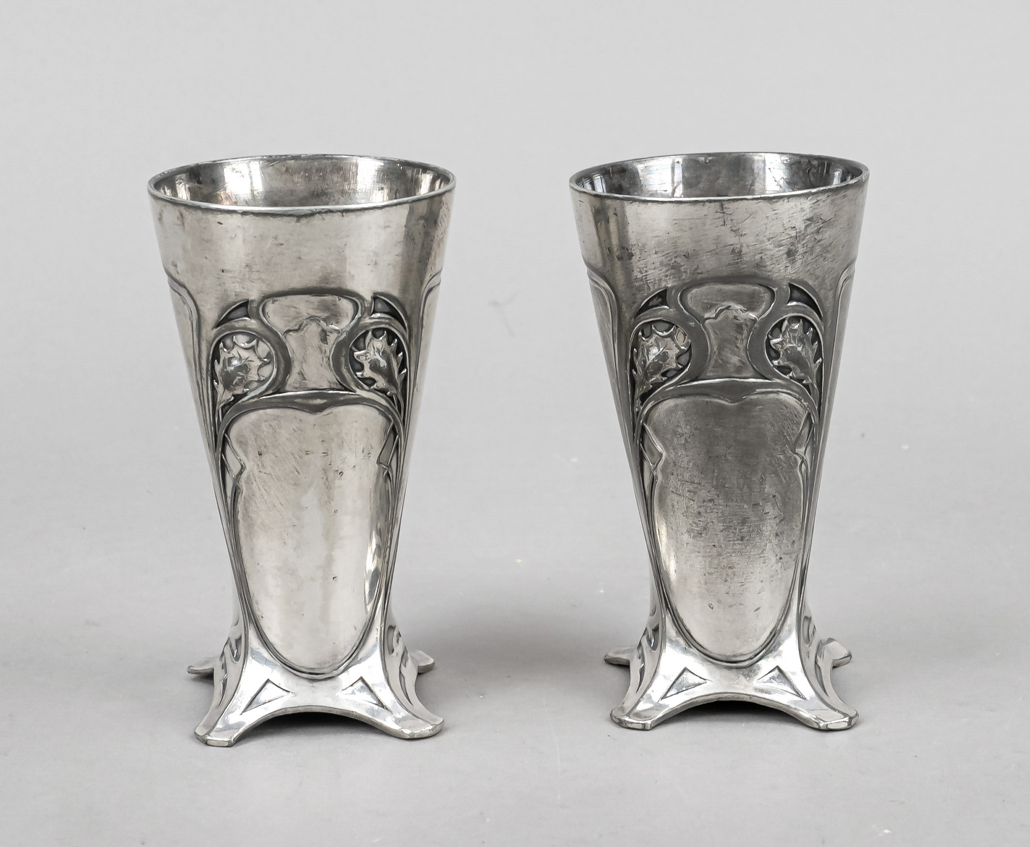 Pair of small Art Nouveau vases, c. 1900, pewter with remnants of silver plating, on 4 feet, body