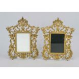 2 picture frames, 20th century, gold-bronzed iron. Square picture frame, surrounded by elaborate