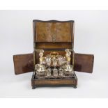 Travel bar, late 19th century, rectangular wooden body with burlwood, mahogany and ebony veneer with