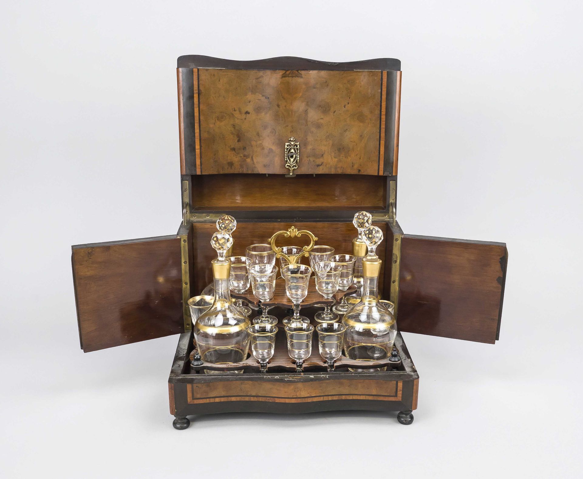 Travel bar, late 19th century, rectangular wooden body with burlwood, mahogany and ebony veneer with