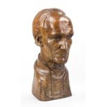 Jean Boedts (1904-1973), life-size bust of a man, light brown stained oak wood, signed and dated