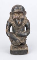 Monkey fetish, West Africa, 19th/20th century, wood and textile, monkey with penis in hand, rubbed