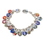 Silver charm bracelet with 18 coat of arms-shaped pendants of German and Swiss travel destinations