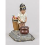 Humorous match holder, late 19th century, polychrome painted and glazed stoneware. Little boy in a